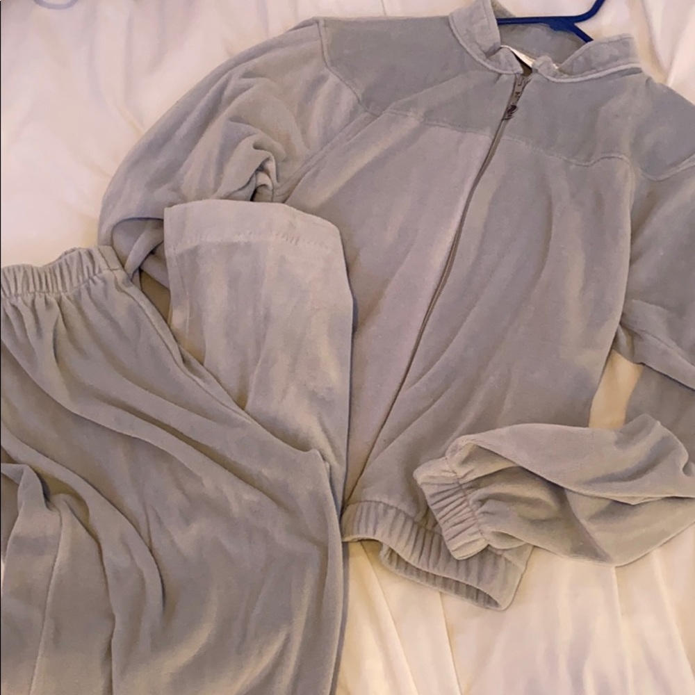 Light grey velour tracksuit.